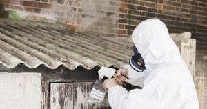 a man works on asbestos removed Melbourne